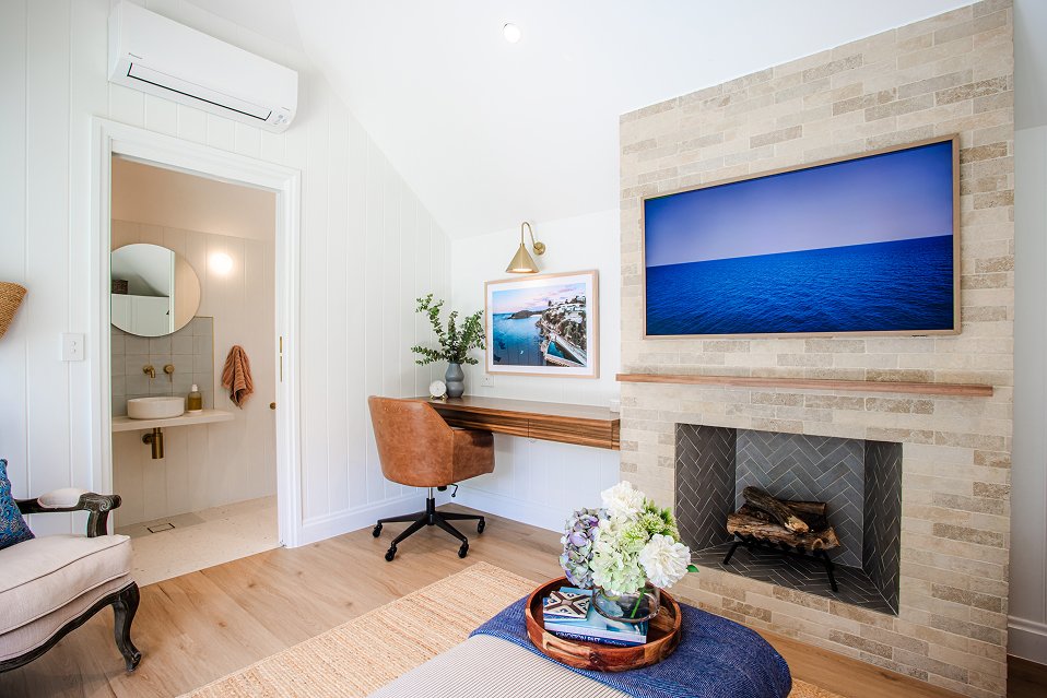 Ace Catlin Electrical installed wall-mounted TV, lighting, and air conditioning unit in a modern Sydney room