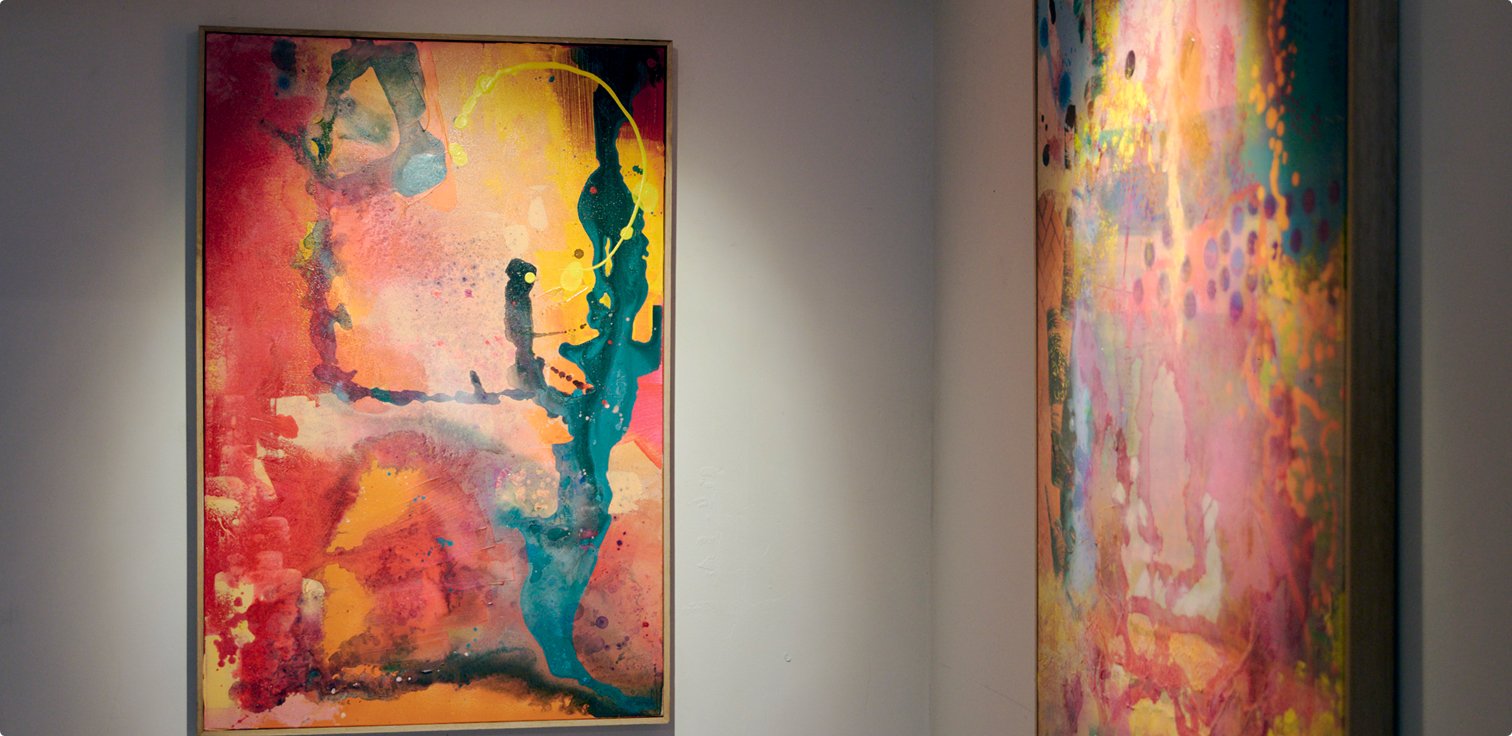 Colourful abstract artwork displayed on a feature wall