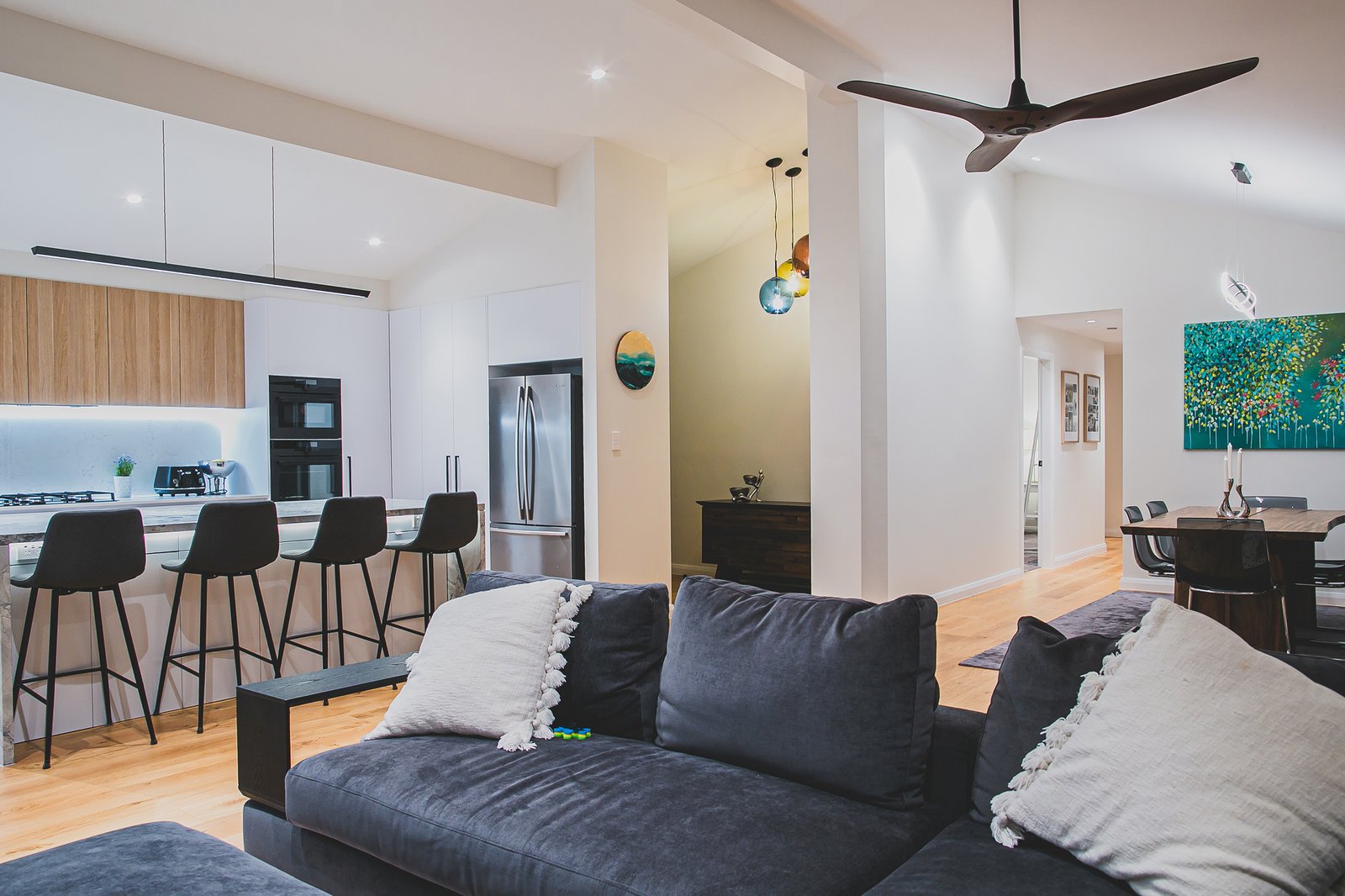 Ceiling fan and downlights installed in a Wahroonga living room